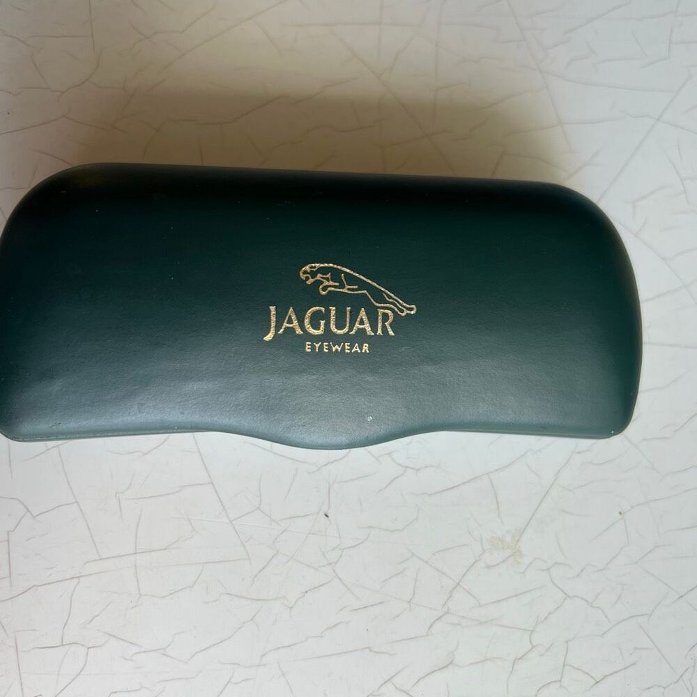 Jaguar dark green hard shell case for  eyeglasses or sunglasses.
